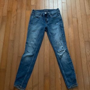 Ripped Calvin Klein Jeans.